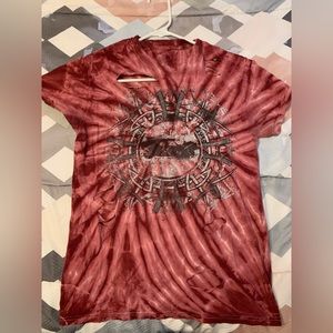 Red tie dye t-shirt. Bought it ripped.
